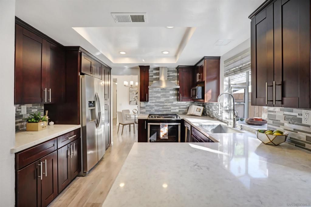 Photo of 10366 Rancho Carmel Dr Dr, San Diego, CA 92128 (MLS # 250042219SD)