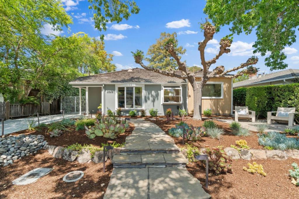 Located on a peaceful cul-de-sac in Palo Alto's sought-after Midtown neighborhood, this thoughtfully updated home blends modern design with laid-back California style. It features 3 bedrooms, 2 bathrooms, separate living and family rooms, as well as an office nook. The Scandinavian-inspired kitchen features clean lines, a gas cooktop and electric oven, large windows, ample counter space, and separate pantry. Recent updates include fresh interior and exterior paint, new lighting, and modernized bathrooms. The laundry room has extra storage and a utility sink for added convenience. The front and back yards are newly landscaped, with multiple seating areas around a sparkling pool and hot tub - ideal for relaxing or entertaining. A detached garage offers storage or potential for a gym or studio. Close to parks, Midtown shops, California Avenue, commute routes, and top-rated Palo Alto schools.