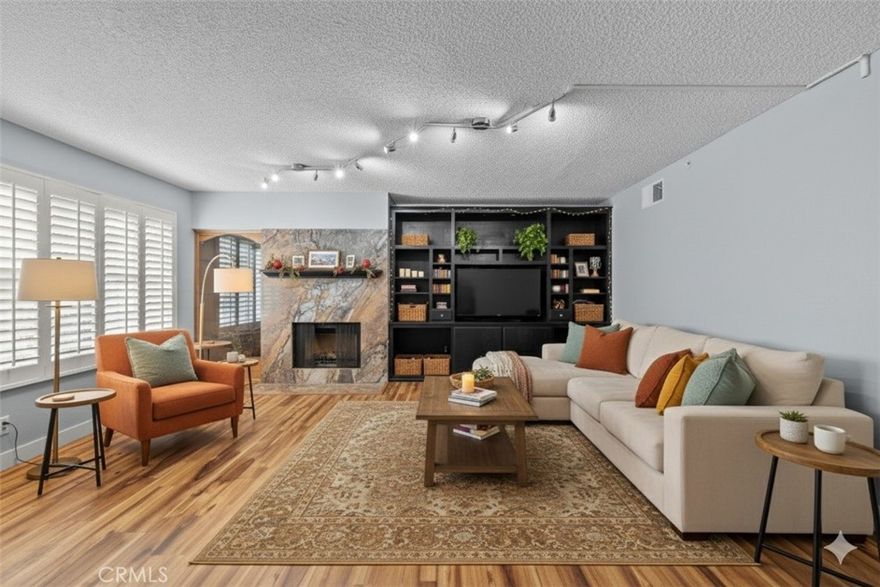 Don’t miss this rare and spacious West Lancaster condominium nearly 2,000 sq. ft. of beautifully maintained living space! This is one of the largest condos in the Antelope Valley, offering 3 bedrooms and 2.5 baths with modern updates and incredible pride of ownership throughout.

Step inside to find high end laminate flooring, plantation shutters, and an upgraded kitchen featuring granite countertops, stainless steel appliances, and white cabinetry. The kitchen opens seamlessly to the dining area and flows into a warm and inviting living room centered around a custom granite fireplace perfect for entertaining or relaxing evenings at home.  Upstairs, you’ll find 3 spacious bedrooms, including a primary suite with walk-in closet space and an updated bath with dual sinks. Enjoy a private patio, ideal for morning coffee or evening gatherings, plus a two car attached garage with the added convenience of an additional parking space right in front of the garage perfect for guests or a third vehicle.  Located just moments from the freeway, shopping centers, schools, and Lancaster City Park, this home offers the best of comfort and convenience with a low HOA