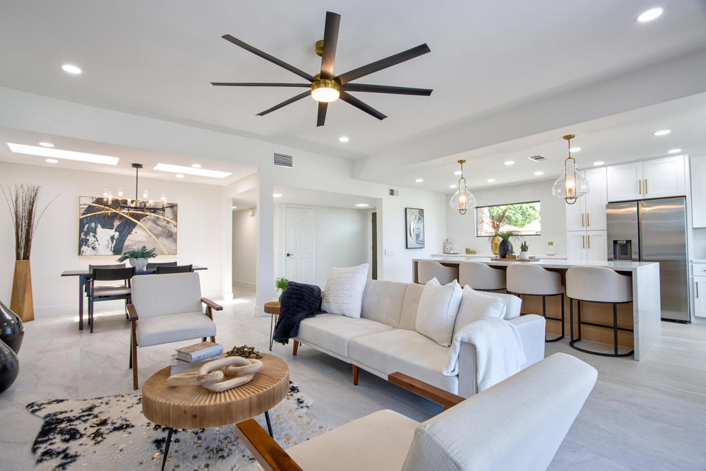 Discover elevated living in this impeccably remodeled 3-bedroom, 2-bathroom condo, ideally situated on a private corner lot overlooking the par-3 6th hole. Set back from the green for added tranquility, the home combines thoughtful design with premium upgrades throughout.Step inside to a spacious open floor plan, where every element has been carefully curated--from the dramatic 24x48 stone tile flooring to the striking floor-to-ceiling fireplace. The chef's kitchen is a centerpiece, featuring quartz countertops, an oversized island, and soft-close cabinetry that marry style with function.The spa-inspired bathrooms offer a serene escape, adorned with designer fixtures and sophisticated finishes. The master suite provides a peaceful retreat with a private en-suite and generous closet space, while two additional bedrooms offer flexibility for guests, a home office, or creative pursuits.Energy efficiency is a plus, thanks to assumable leased solar panels--an ideal solution amid rising utility costs.Enjoy breathtaking fairway views and the serenity of lush surroundings, perfect for relaxing or entertaining. As a resident of Sunrise Country Club, you'll have access to world-class amenities including golf, tennis, pickleball, fitness center, multiple pools, and on-site dining at the Grill and Dining Room.Located in the heart of Rancho Mirage, you're just minutes from premier shopping, entertainment, healthcare, and Palm Springs International Airport.