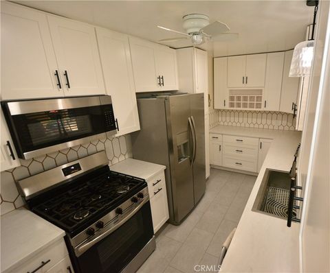 Photo of 8903 Songfest Dr, Pico Rivera, CA 90660 (MLS # PW26083357)