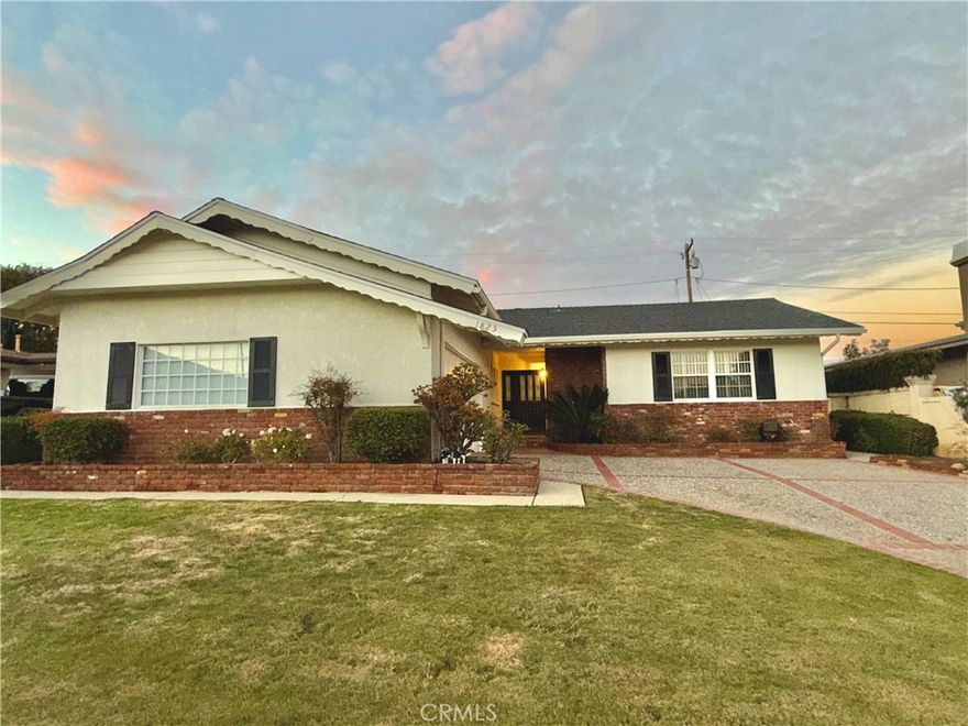 This single-level, spacious and recently renovated 4-bedroom, 2-bathroom home has new interior paint throughout, new hardwood floors in the living room, newly refinished hardwood floor throughout. New recessed lighting in the living room, hallway and formal dining room. New rear sliding doors lead you outside to the concrete patio with the large grass backyard and a separate concrete area for additional entertaining.