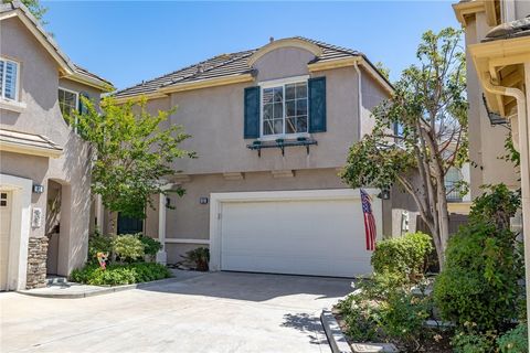 Photo of 63 Poppyfield Lane Ln, Rancho Santa Margarita, CA 92688 (MLS # OC26082263)