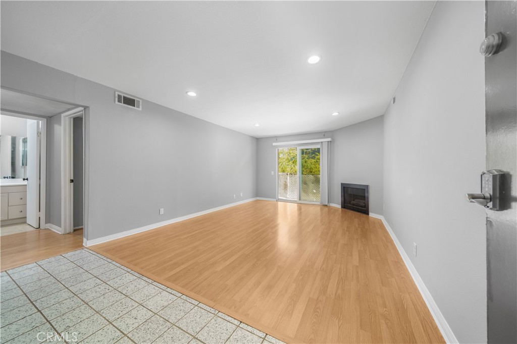 Welcome to this beautifully maintained upper-level, single-story condo in the desirable Patricia Gardens community, featuring 2 spacious bedrooms and 2 bathrooms. Centrally located in the heart of Simi Valley, this home offers easy access to shopping, dining, schools, family parks, the Arroyo Greenway, and the 118 freeway. The interior is filled with natural light, complemented by recessed lighting, dual-pane windows, tile and laminate flooring throughout, and a cozy living room fireplace that opens to a private balcony patio. The kitchen is tastefully upgraded with granite countertops and a tile backsplash, while the primary suite offers dual closets, a granite dual-sink vanity, and an upgraded tile stand-up shower. Additional conveniences include an in-unit laundry with stackable washer and dryer (included in the sale), plus a carport with storage directly below the unit. Community amenities include a sparkling pool, relaxing spa, and clubhouse, making this the perfect opportunity to enjoy comfort and convenience in one of Simi Valley’s most welcoming neighborhoods.