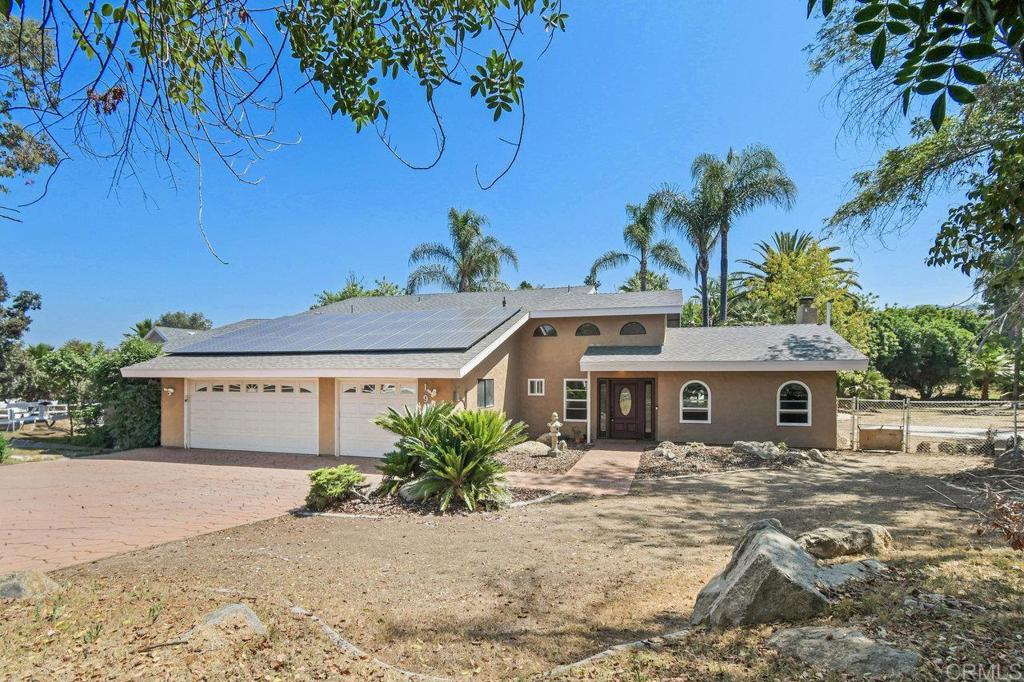 LARGE LOT WITH GUEST HOUSE! Welcome Home! This is a wonderful opportunity for a multi-generational property or extra rental income! In the main home, you'll find 4 bedrooms and 3.5 bathrooms. Along with a spacious ground-floor primary bedroom, you'll discover a one-of-a-kind custom walk-in closet! Stepping outside, you'll find an entertainer’s paradise where you can enjoy a front-row seat to the Fourth of July fireworks from the pool or hot tub! Recently remodeled, the guest home is perfect for personal use or as steady rental income. Featuring 1 bedroom, 1 full bathroom, a kitchenette, and a spacious living room. Great location offering privacy while also being close to excellent schools! Don’t miss out on this opportunity!
