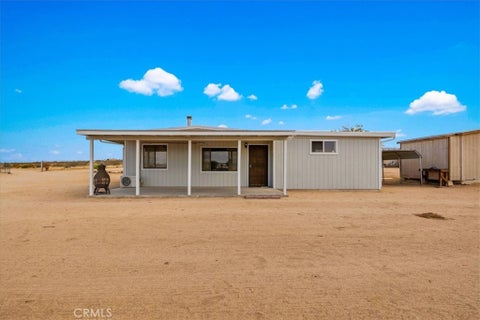 Photo of 5566 Oleta Rd, Landers, CA 92285 (MLS # JT26200949)