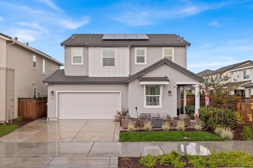 Welcome to River Islands! This stunning 3-bedroom, 2.5-bathroom, plus den/office is situated in one of Lathrop's most coveted communities. Enjoy the open concept floor plan complete with an elegant fireplace and grand kitchen island, perfect for modern living with plenty of space for entertaining. The spacious bedrooms offer ample storge with walk-in closets and sophisticated bathrooms.  The California Room creates a seamless transition between the interior and exterior spaces. Delight in the custom landscaping that is well appointed for year-round outdoor living and gatherings. The upgraded garage with Tesla Charger is a fantastic bonus flex-space for a dedicated home gym, play or media room. Take advantage of all that this River Islands property has to offer; steps to lakes, parks, trails, community amenities and exclusive top rated Charter Schools. Dont miss this gem!