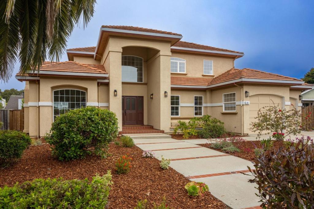Value you've been looking for!! Welcome to this elegant Mediterranean-style residence! High ceilings greet you, bathing the entryway in natural light. Off the grand entry are a high-ceilinged living room & formal dining area, perfect for entertaining in style. Hardwood floors add to the home's timeless elegance. Also downstairs are a convenient laundry room w/garage access & half bath. The gourmet kitchen is equipped with a spacious pantry & island, inviting culinary creativity. A dedicated home office offers a serene space for productivity. The family room opens to an expansive patio, surrounded by a large back yard featuring lush fruit trees, raised garden beds, fully fenced perimeter, and attached storage shed. Retreat to the primary suite, where luxury meets comfort with dual walk-in closets and a spa-like ensuite bath with stall shower, large jetted tub, dual sinks. Additional bedrooms, including a junior ensuite, provide ample space for family and guests. Discover peekaboo ocean views and gorgeous sunset views from the upstairs bedroom & primary bath. Embrace a lifestyle of sophistication and serenity in the sought-after Highland neighborhood close to downtown HMB, with convenient access to commute routes to Peninsula cities, Silicon Valley, and San Francisco.