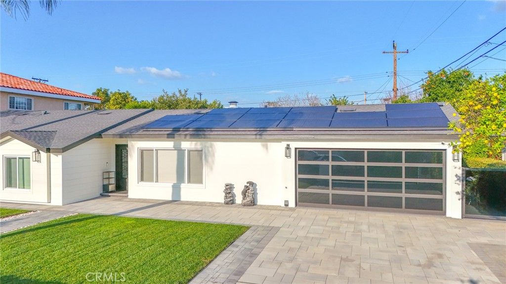 Photo of 9145 Raviller Drive, Downey, CA 90240 (MLS # DW26017733)