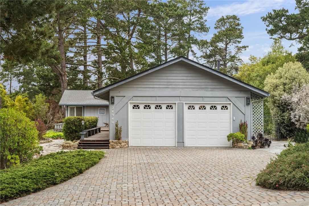 This ranch style home is located in the Carmel Views on over 1/2 an acre and enjoys panoramic ocean views extending to Point Lobos. A beautiful brick fireplace rising up to the vaulted ceiling separates the large family room and dining room from a large living room. As a great bonus, through the living room you will find an awesome game room featuring a full wood wet bar and room for a pool table or install your own golf simulator. At just under 2200 square feet, you can update and remodel this 3 bed, 2 bath home to fit your own wants and needs.
With the large lot, you have plenty of room to add a sport court. You can also have expand the home out and/or up to increase the size of the home and expand your view! The current home features views from the family room and primary bedroom. Just up the street are homes recently sold for over $3.5M -- your improvement will be well worth it!
Don't miss your chance to make this home your dream home.
Water Credits may allow for building an ADU