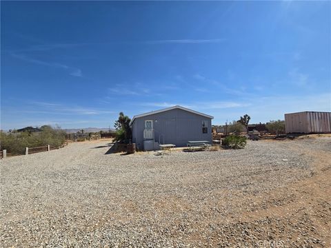 Photo of 3300 Marvin Drive, Yucca Valley, CA 92284 (MLS # JT25132347)