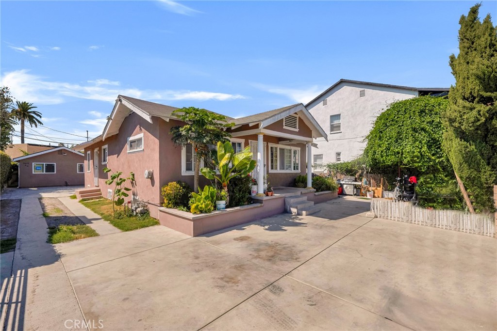 Opportunity knocks in the highly sought-after West Adams neighborhood! This versatile property features a duplex PLUS a stand alone brand-new 2 bedroom, 1 bathroom ADU built in 2025—completely vacant and ready for its first resident or new owner to move in. The front unit is a stand alone spacious 3 bedroom, 1 bathroom home with an additional den currently being used as a 4th bedroom. Tucked behind it is a beautifully remodeled detached 1 bedroom, 1 bathroom unit, upgraded with a new sewer & plumbing, AC split unit, and a tankless water heater. Lastly, the crown jewel of the property is the detached, newly constructed 2 bedroom, 1 bathroom ADU, thoughtfully designed with modern finishes, its own private entrance, tankless water heater, new sewer & plumbing, and a energy-efficient AC split system. Whether you’re looking to live in the ADU and rent the others or fully lease all three units for maximum cash flow, this setup offers flexible living and income-producing potential. Did we mention the vacant 2 bedroom, 1 bathroom ADU is ready for immediate occupancy? It’s perfect for owner-users looking to live comfortably while their tenants help cover the mortgage. Investors will appreciate the ease of leasing out this newly built ADU, which is a rare find in such a desirable location. Located minutes from Culver City, Fairfax, The Grove, Kaiser Permanente, and with quick access to the 10 and 405 freeways, the location offers unbeatable convenience. Shopping, dining, and neighborhood charm surround this multifamily gem. Don’t miss your chance to secure a property that blends location, functionality, and rental upside. The vacant 2 bedroom, 1 bathroom ADU is the perfect blend of comfort and opportunity in one of LA’s fastest-growing neighborhoods. Seller pays for water, adding even more value to this income-generating property!