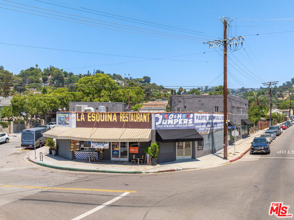 Set on a high-visibility corner in the heart of Northeast Los Angeles, 3301 Division Street offers a rare and compelling mixed-use investment opportunity at the intersection of Division Street and Glassen Place. Spanning approximately 10,475 square feet of land, the property features 7,630 square feet of existing improvements and a diverse unit mix, including retail storefronts, office space, residential apartments and free-standing residential bungalows. Zoned LAC1 and located within the Mount Washington Glassell Park Specific Plan, this property offers both strong in-place income and significant development upside. Currently generating $13,669 per month, with projected pro forma rents indicating more than 30% rental growth, the site is ideal for investors or developers seeking long-term value in a rapidly appreciating market. Preliminary architectural studies envision several development scenarios ranging from new residential over parking to live/work layouts and affordable housing components that could unlock increased density and reduced parking requirements. With excellent street presence, flexible zoning, and close proximity to the emerging corridors along Cypress Avenue and San Fernando Road, 3301 Division Street is a standout opportunity in one of LA's most dynamic, high-growth neighborhoods.