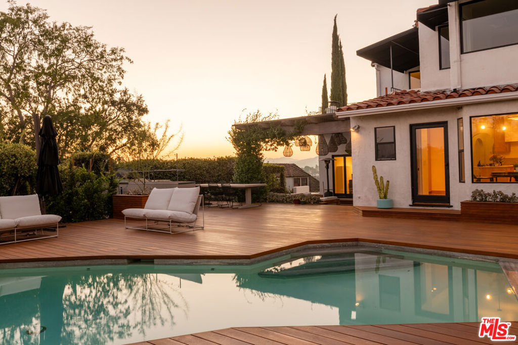 A rare offering in the heart of Silver Lake this completely reimagined estate has been meticulously renovated from top to bottom, with no detail overlooked. Every system, surface, and finish has been updated, and the home has never been lived in since its transformation, offering a truly turnkey experience. The main residence seamlessly blends preserved architectural character with sophisticated modern design, featuring light-filled interiors, a chef's kitchen with premium appliances, and thoughtfully designed living spaces. A separate ADU with its own private entrance provides ultimate flexibility perfect for guests or a private creative studio.Outdoors, the property is designed for entertaining, with expansive patios, a sparkling pool with pool bath, and breathtaking views of Downtown Los Angeles. Ideally located, this home offers a highly walkable lifestyle just moments from the Silver Lake Reservoir, as well as the acclaimed restaurants, coffee shops, and boutiques of Silver Lake Boulevard all within the coveted Ivanhoe School District. This exceptional home is also available fully furnished for lease at $16,000/month, providing a seamless move-in experience. This is a rare opportunity to lease a fully renovated, character-rich home with views, resort-style outdoor space, and flexible living options in one of Los Angeles' most desirable neighborhoods.