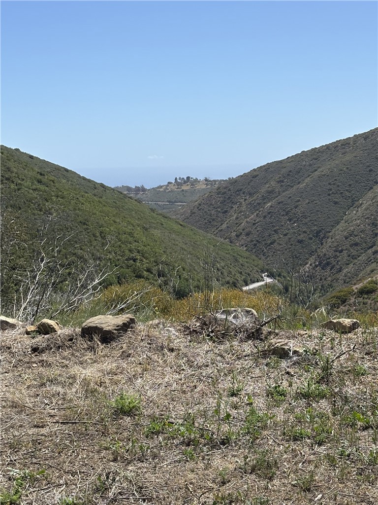 Over 4 Acres to build your Dream Home Near the Coast! Just 2.5 miles from the Pacific Coast Highway, this prime piece of land offers over 4 acres of opportunity. Nearly ALL utilities have already been done for you! And with partial ocean views, it’s the perfect spot to build your dream home or potentially multiple single-family residences (buyer to verify). Property Highlights: A little over 4 acres of buildable land. Partial ocean views. Located just minutes from PCH. Potential for multiple single-family homes (check with city/county for zoning and development guidelines) Some utilities available. Tons of potential for developers or custom home builders A rare opportunity in a highly desirable coastal area — bring your vision and make it a reality!