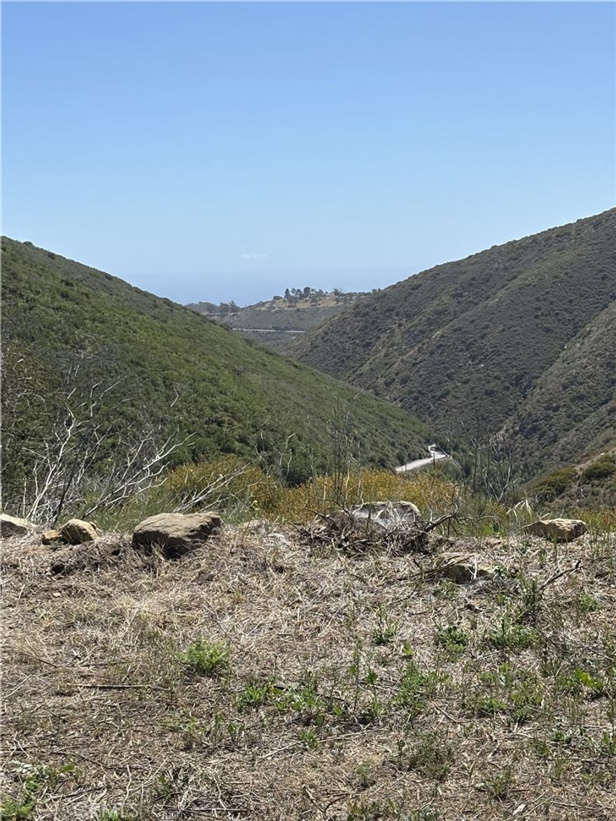 Over 4 Acres to build your Dream Home Near the Coast! Just 2.5 miles from the Pacific Coast Highway, this prime piece of land offers over 4 acres of opportunity. Nearly ALL utilities have already been done for you! And with partial ocean views, it’s the perfect spot to build your dream home or potentially multiple single-family residences (buyer to verify). Property Highlights: A little over 4 acres of buildable land. Partial ocean views. Located just minutes from PCH. Potential for multiple single-family homes (check with city/county for zoning and development guidelines) Some utilities available. Tons of potential for developers or custom home builders A rare opportunity in a highly desirable coastal area — bring your vision and make it a reality!