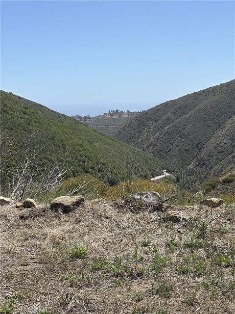 Photo of 12110 Yellow Hill Road, Malibu, CA 90265 (MLS # OC25167326) Photo of 12110 Yellow Hill Road, Malibu, CA 90265 (MLS # OC25167326)