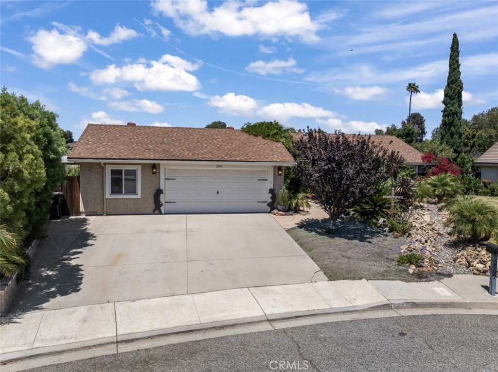 Welcome to this beautifully maintained 4 bedrooms, 2 baths, single-story home located on a spacious lot in a quiet Thousand Oaks cul-de-sac. With 2,186 sqft of living space, including a permitted bonus room off the kitchen, this home offers flexible options for a home office, gym, or creative studio. Inside, enjoy vaulted ceilings, skylights, crown molding, and dual-pane windows throughout. The kitchen features granite countertops, a breakfast bar, walk-in pantry, and a bright dining area—ideal for both everyday living and entertaining. The updated primary bathroom adds a touch of modern comfort. The drought tolerant landscaped front yard offers excellent curb appeal, while the backyard is a true gardener’s dream. Enjoy a large custom walk-in greenhouse, perfect for year-round growing, and a variety of mature fruit trees, including avocado, persimmon, lime, lemon, tangerine, grapevines, peach, banana, mulberry, and more. The outdoor living space also features a newer patio, gazebo, and stamped concrete making it perfect for entertaining or relaxing in your private oasis. A spacious 2-car garage adds storage and convenience. Best of all—NO HOA! Close to top-rated schools, parks, shopping, and dining, this home blends indoor comfort with stunning outdoor space in a highly desirable location.