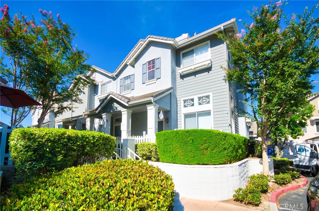 Welcome to 9 Coveside Ct, a beautifully maintained tri-level townhouse in the gated Lakeside Villas community. This spacious home offers 3 bedrooms and 2.5 bathrooms across approximately 1,513 square feet. The main level features a cozy living room with a fireplace and durable tile flooring, seamlessly connecting to an open family room and an eat-in kitchen. Upstairs offers three comfortable bedrooms and a convenient indoor laundry closet, with easy-to-maintain laminate wood flooring throughout. The attached two-car garage provides ample parking and storage, while central air conditioning and heating ensure year-round comfort.
Enjoy resort-style living with access to community amenities including an 8-acre lake with paddle boats, junior Olympic pool, spa, clubhouse, playground, basketball court, and scenic walking paths. Located close to shopping, dining, Metrolink station, golf courses, and major freeways, this home perfectly balances comfort, convenience, and lifestyle.