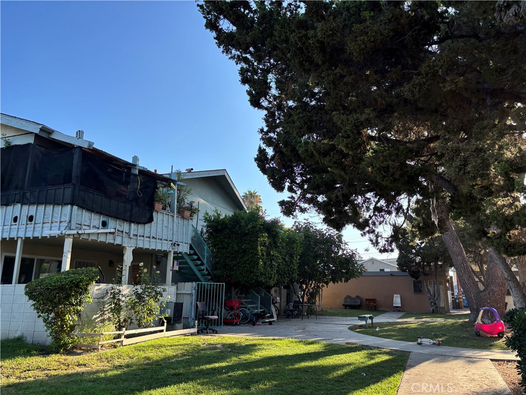Great investment-- All 2 Bedroom 2 bath fourplex with grassy yards and sprinkler system with timer. Highly desired rental units. Units are spacious at approximately 955 sq. ft. per unit. Features include breakfast bars flowing to dining room. 2 upper units with large covered balconies; 2 lower units with enclosed front patio courtyards. All are end units. Single car garage with newer roll up doors for each unit. Extra 5th garage rents for $150 per month. Most units have updated improvements--bathrooms, floors, kitchens, lighting. All have a 220 A/C outlet n living room. Community laundry room generates additional income. Placentia Yorba Linda Unified School District attendance area. Located on a cul-de-sac near a local city community center and Mira Loma Park. Plenty of yard space to enjoy.