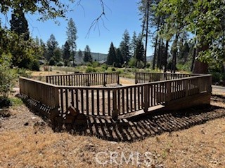 Scenic Vacant Lot on a Quiet Cul-de-Sac – Large Trees, Raised Deck & More!
Don’t miss this rare opportunity to own a beautifully situated piece of land on a peaceful cul-de-sac! This expansive lot offers a serene natural setting with mature, towering trees that provide both shade and privacy. Whether you’re dreaming of building your custom home or investing in a tranquil getaway, this property has it all.
Already enhanced with a raised deck perfect for relaxing or entertaining, the lot also features a stamped concrete walkway that adds charm and functionality. A professionally built retaining wall adds structure and value, making the space ideal for landscaping or future development. Best of all, the property offers direct access to a scenic walking path — perfect for morning jogs, leisurely strolls, or bike rides.
Nestled in a quiet and established neighborhood, this lot offers the perfect combination of seclusion and convenience. Bring your vision and make this stunning lot your own