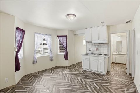 Photo of 1581 Chanticleer Rd #B, Anaheim, CA 92802 (MLS # HD26037649)