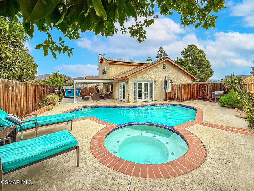 This may be the home you've been dreaming of! Absolutely gorgeous with VIEWS! Highly remarkable location at the end of the cul de sac, steps away from the Greenbelt which has direct access to Wildflower Park in Desirable *Wildwood* neighborhood of Thousand Oaks.  Open floor plan with numerous windows dressed with views which provide a bright and spacious atmosphere.  Family room, offers a gas burning fireplace, and is adjacent to the kitchen and leads to the custom covered patio with recessed lighting, numerous gas outlets for your BBQ and firepit ALONG with private Pool and Spa, perfect for entertaining.   Newer tile and Hardwood floors throughout, newer dual pane windows, recessed lighting added, 9' ceilings, indoor laundry and more. The spacious master suite offers a private balcony, has a walk in closet and a private Remodeled bathroom including a large Custom Shower. Owners have created a wonderful oasis wtih mature Honeybell Orange Tree that produces fruit all winter, and Passion Fruit tree that produces fruit all summer. Solar Panels are paid off and there is an installed Level 2 EV charger too! Such a wonderful place to call home and entertain guests. Easy freeway access, close to shopping, also close to CLU and Amgen with multiple parks and a block away from the award winning Wildwood Elementary, and Wildwood Hiking Trails too!  Indoor and Outdoor Living at it's best!