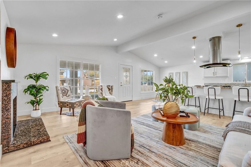 Beautifully renovated home located at 4122 W Kent, Santa Ana, within the highly regarded Garden Grove Unified School District. This move-in-ready residence features new flooring throughout, recessed lighting, and modern light fixtures, creating a bright and contemporary feel. The open layout showcases a kitchen that flows seamlessly into the living room with a cozy fireplace, perfect for everyday living and entertaining. Enjoy year-round comfort with central AC and the rare benefit of three master bedrooms, offering exceptional flexibility for multi-generational living or guests. Conveniently located near Mile Square Park, shopping, dining, and with easy access to the 405 and 22 freeways, this home combines modern upgrades with an excellent location in the heart of Orange County.