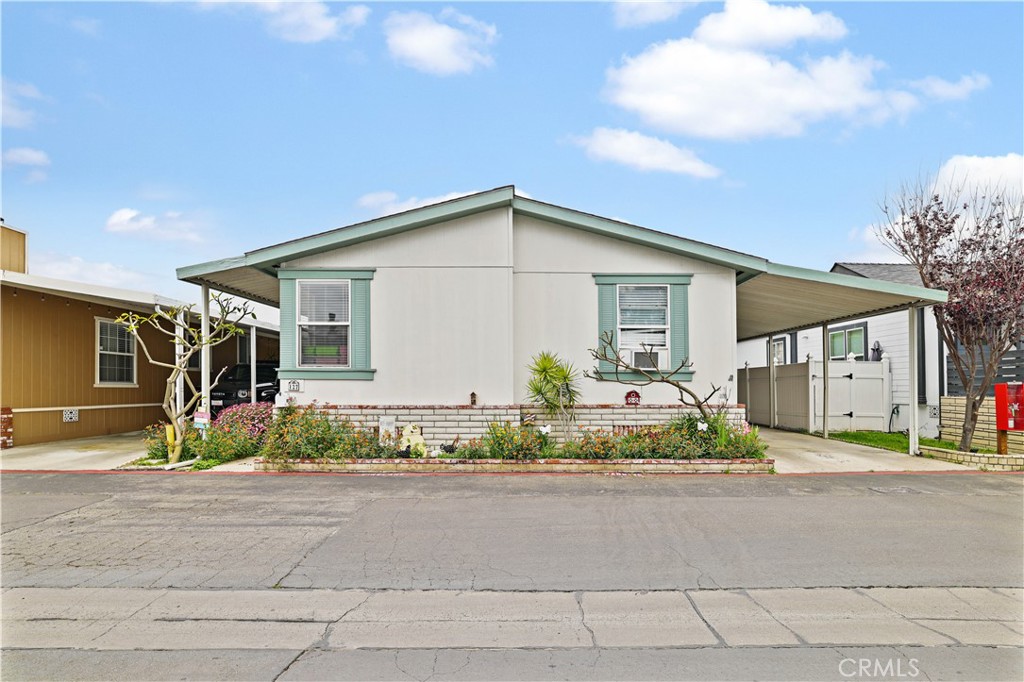 Welcome to 127 Sumac Lane, a Large Four (4) Bedroom (double-wide) Manufactured home nestled within the family-friendly Fountain Valley Estates community. This home offers a blend of modern amenities and comfortable living spaces, all on leased land in a well-maintained manufactured home park. Property Features: Spacious Layout: Encompassing apx 1,700 square feet, this home boasts 4 bedrooms and 2 bathrooms. The open floor plan seamlessly connects the living, dining, and family areas, creating an inviting atmosphere for both relaxation and entertainment. Gourmet Kitchen: The kitchen is equipped with ample counter space, nice counter tops and back splash, abundant storage, and appliances. Master Retreat: The oversized master suite features a luxurious bathroom with a separate tub and shower, providing a private sanctuary within the home. Additional Amenities: High ceilings adorned with ceiling fans throughout, a convenient shed for extra storage, two dedicated parking spots enhance the functionality and comfort of this residence. Community Amenities: Fountain Valley Estates offers residents access to a private clubhouse complete with a heated pool and spa, fitness center, and gated entrance, all just minutes from the beach. Location and Lifestyle: Fountain Valley is known for its suburban charm, excellent schools, and proximity to Southern California's beaches and attractions. The city boasts a Walk Score of 56, indicating that some errands can be accomplished on foot. Public transportation is available, with a Transit Score of 32, and the area is considered bikeable, with a Bike Score of 66. Nearby Shopping and Schools: The property is conveniently located near various shopping centers, providing residents with a range of retail and dining options. Fountain Valley's school district is highly regarded, with schools such as Courreges (Roch) Elementary School (8/10), Fulton (Harry C.) Middle School (9/10), and Fountain Valley High School (10/10) serving the area. Experience the best of manufactured home living at 127 Sumac Lane, where modern comforts meet community conveniences in Fountain Valley. No age restrictions, as this is a Family Park.