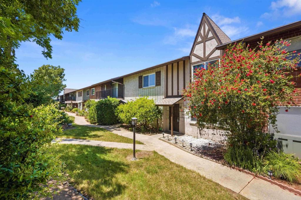Lovely Villa Del Rhine townhome featuring 3 bed/1.5 bath, large enclosed patio, 2 car detached garage, all bedrooms located upstairs, central A/C & heat.