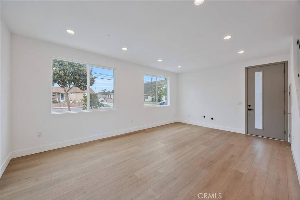 Welcome to this brand-new, beautifully designed home in the heart of Garden Grove! Built in 2025, this spacious 2,148 sq. ft. property offers 4 bedrooms and 3.5 bathrooms, including two master suites, perfect for multi-generational living or those seeking extra comfort and privacy. This home features soaring 10-ft ceilings, premium finishes throughout, a sleek modern kitchen with top-of-the-line appliances. Additional amenities include a 2-car garage for secure parking and storage, as well as a convenient washer and dryer hookup to make laundry a breeze. The property is ideally located near 22-freeway, Disneyland, and dining options, offering both convenience and charm. Please Text or call Jay with date and time of showing 949-392-6614