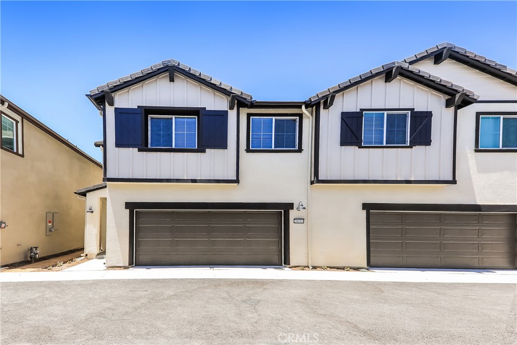 This home is professionally managed by Tricon Residential, dedicated to creating exceptional rental experiences. Featuring three bedrooms, two and one half bathrooms, and approximately 1,676 square feet, this well-maintained home offers a high standard of rental living, supported by a team that puts residents first. Tricon Menifee is a secure gated rental community nestled between San Diego and Orange County. Enjoy virtually maintenance-free living with the conveniences of smart home technology including automatic thermostat control and keyless front door entry. Every home offers open concept designs including stainless steel appliances, quartz countertops, two-car attached garages, and in-home washer and dryer. Enjoy well-maintained community amenities including a lap pool and spa, sundeck with ample seating, dog park, tot lot/playground, fire pit, BBQ area, fitness center and clubhouse.