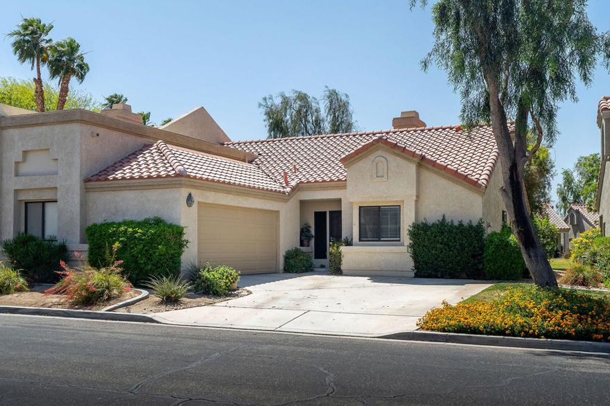 Welcome to Palm Desert Resort Country Club - an amenity-rich community offering something for everyone. Residents and their guests enjoy access to 20 pools and spas, golf, tennis, bocce ball, a full-service pro shop, clubhouse, cafe, and more -- all with no social membership fees. Pickleball enthusiasts will love the private club, which offers discounted rates for homeowners and access for their guests.This beautifully updated home is move-in ready and showcases a tasteful remodel, including a modernized kitchen and bathrooms, updated flooring, and elegant, upscale furnishings throughout. The classic floorplan features an indoor laundry room, private driveway, two-car garage, and a split layout with vaulted ceilings. The primary suite includes double sinks, a soaking tub, water closet, walk-in closet, and a spacious feel that combines comfort and functionality.Enjoy west-facing views and the convenience of a nearby pool. This gem won't last long - come experience the lifestyle at The Resorter!