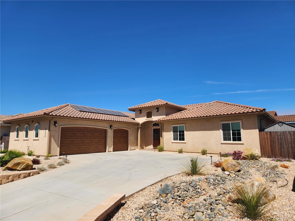 Welcome to 4654 Hummel Drive — a newer, single-story Mediterranean-inspired home in the heart of Orcutt, with no HOA fees. This turn-key custom build offers serious style, smart upgrades, and nearly 2,750 sq ft of functional elegance across 3 bedrooms and 2.5 bathrooms.
The current owner has invested $100K in upgrades to elevate the property inside and out. The professionally landscaped backyard includes pet-friendly turf, pavers, decorative rock, a cozy outdoor gas fireplace, and fruit trees (lemon, orange, Santa Barbara peach, and Fuyu persimmon). Timed path lights and uplighting enhance the ambiance, while a pushed-back rear wall adds both space and functionality. A storage shed offers added convenience and spacious lot to accommodate RV parking. Interior perks include roller shades, privacy film on the bathroom window, polyurea-coated garage flooring, upgraded lighting, custom cabinetry, and a keyless entry system.
Inside, enjoy soaring ceilings, abundant natural light, and a grand entry leading into an open-concept layout — ideal for entertaining or relaxing. The kitchen features white quartz counters, premium stainless appliances, and flows seamlessly into the great room and backyard.
Owned solar, a tankless water heater, and a modern fire suppression system add efficiency and peace of mind. All just minutes from parks, trails, shopping, restaurants, and the charm of Old Town Orcutt.