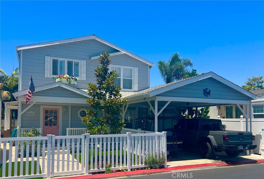 One of a kind 2 story custom home in Bayside Village in the heart of Newport Beach. This spacious property is well located on a quiet street and boasts 3 bedrooms and 2 1/2 baths, an open spacious living room, formal dining room plus a large kitchen with pantry closet and large laundry room. Also, there is a convenient half bath on the first level. Upstairs is an oversized primary bedroom with views out toward the mountains and Fashion Island plus a large master bathroom with circular soaking tub & shower and large closet. Additionally there are 2 well sized bedrooms, closets and full bathroom plus storage! Outside there is fenced front yard area with artificial turf which is a great area to relax. There is a patio off the kitchen on the side of the house and storage space behind. An oversized covered carport can accomodate two large cars or 3 smaller vehicles plus it has a storage shed and storrage above. Bayside Village has numerous amenities including 2 clubhouses, 2 pools/2 jacuzzis, billard room, fitness room, private beach, picnic areas with barbeques plus a dog park! Property is on leased land at $3200 monthly includes water & trash. Come live the Newport Beach lifestyle at a fraction of the cost of nearby neighborhoods.