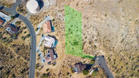 Photo of 0 Elk Court, Yucca Valley, CA 92284 (MLS # CV26023539)