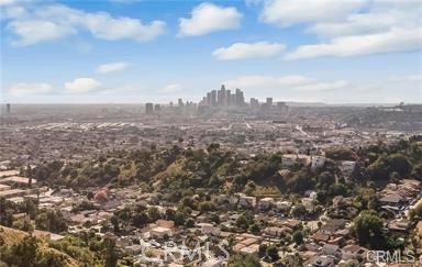 Great Investment Opportunity to build "Your Dream Home". Exceptional vacant lot located in the Rose Hills/Lincoln Heights area. Imagine a spacious vacant lot, with a breathtaking view of the iconic DTLA skyline. This unique piece of real estate is a canvas upon which you can design and build your dream home. The lot is generously sized, providing ample room for creativity and landscaping. It's situated on a downslope lot in a very quiet neighborhood. Utilities nearby, centrally located and easy freeway access within minutes from DTLA and the many restaurants nearby. APN 5209-008-021 and 5209-008-022, total of 8,460 square feet. Buyers and Buyer's agent are advised to do their own due diligence. Buyer and Buyer's agent to rely on their own investigations. Please contact Building and Safety for detailed questions, building and permits. DRIVE BY ONLY. Buyer responsible for survey and property clean up. Seller will not provide reports nor survey.