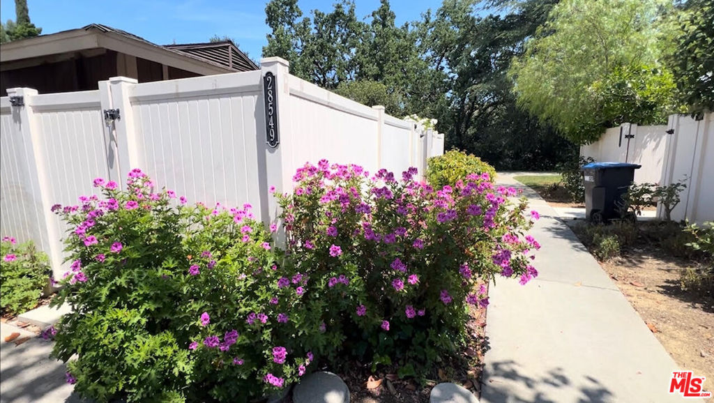 From the mature trees that surround this home, to the three patios positioned perfectly to enjoy the Southern California weather, this one story corner unit town home will make for the perfect oasis to relax at the end of your day. This unit has an open floor plan and 3 total private patios- one attached to each bedroom and one just off of the living room providing for a seamless connection between the indoor and outdoor space. Retire for the night in your primary bedroom suite with its own patio that backs to open space. Minutes away from an abundance of hiking, biking, parks, horse trails and the beaches of Malibu, you will never again be short on adventures to fill your off days. Only a two minute walk and the association pool and spa are waiting for you. Award winning schools, top notch dining, and placed right in the heart of the Conejo Valley. Complete with in unit laundry, two side by side parking spaces, ample storage, and central heat and air, this unit is a must see. No Dogs. Cats are OK. Fireplace is Decorative only.