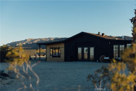 Photo of 75243 Sullivan Rd, 29 Palms, CA 92277 (MLS # JT26084423)