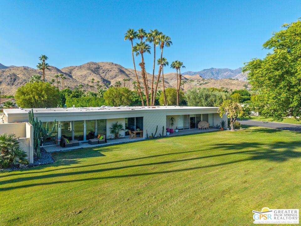 Indulge in the ultimate desert lifestyle at Seven Lakes Golf and Country Club! This stunning 2-bedroom, 2-bath Mid-Century Modern residence has been thoughtfully remodeled to combine timeless design with modern comforts. Every detail has been carefully maintained and upgraded, from newer windows and sliders to the electric panel, roof, HVAC system, water heater, and main water line - offering true peace of mind. Inside, the open-concept floor plan is flooded with natural light and features soaring ceilings, creating an airy, welcoming atmosphere. Entertain with ease as the living, dining, and kitchen areas flow seamlessly together, while the living room frames panoramic views of three pristine fairways. Step outside to a spacious private courtyard, perfect for morning coffee, alfresco dining, or simply soaking in the serene desert surroundings. Originally developed under a Tribal Lease, Seven Lakes has since transitioned to highly desirable Fee Simple Ownership, offering lasting value and peace of mind for homeowners. Seven Lakes Country Club is the fabulous mid-century modern community situated on 120 prime acres of South Palm Springs. Seven Lakes offers 24 hour guard-gate, a magnificent manicured 18 hole 2717 yard 58 par executive course, a club house with restaurant and bar. 15 community swimming pools and 15 spas as well as full sized tennis courts and pickleball courts. Built between 1964 and 1972, Seven Lakes Golf & Country Club is a private, mid-century modern gated community of 341 homes. Situated on 120 acres, Seven Lakes is in the southern section of Palm Springs in zip code 92264, close to downtown and shopping. The community provides breathtaking views over a Ted Robinson designed 18 hole executive golf course enhanced by mid-century modern architecture designed by Ric Harrison and William Cody. The Richard Harrison designed residences are situated throughout the golf course with stunning mountain views reflecting the natural beauty of the desert. Seven Lakes Golf & Country Club located just a few miles from downtown Palm Springs, surrounded by the Santa Rosa and San Jacinto Mountains. Living at Seven Lakes means access to unparalleled amenities: an iconic William Cody-designed clubhouse, a championship golf course crafted by Ted Robinson, 15 sparkling pools and spas, and round-the-clock guarded security. Here, every day feels like a luxury retreat. Don't miss the opportunity to own a home that combines style, comfort, and world-class resort living in one spectacular package.