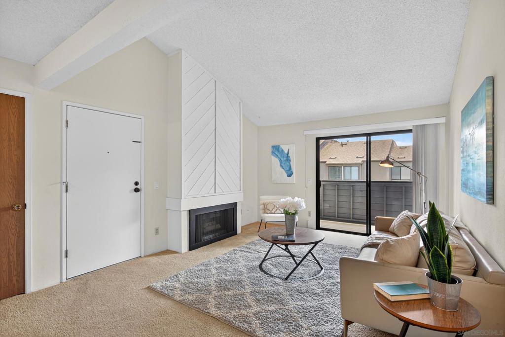 1 bedroom 1 bath upstairs unit in centrally located Serra Mesa. This spacious unit features in unit washer/ dryer, walk-in closet, dishwasher, fireplace and balcony overlooking the pool and jacuzzi. Two assigned parking spots included. Minutes away from the 805, 5 and 8. Move-in ready or upgrade to your tastes. Well-managed community.