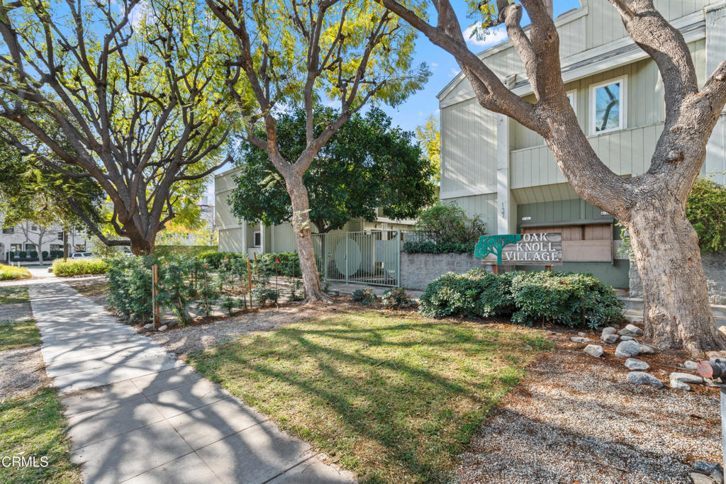 This delightful, light-filled one-bedroom, one-bathroom townhouse is perfectly situated in the heart of the Pasadena Playhouse District, Old Town, El Paseo Shopping Center and the Shops On Lake offering the perfect blend of urban convenience and stylish, relaxed living. Upstairs, natural light pours through a skylight into the open-concept living area with soaring vaulted ceilings, rich hardwood flooring and a cozy decorative fireplace. Flowing seamlessly from the inviting living area, the kitchen offers a perfect balance of practicality and comfort, with plenty of natural light and ample space for dining. The kitchen features a breakfast bar, eat-in area and large double windows, making it a bright and functional space for everyday living or entertaining. The bedroom includes new carpet, abundant closet space, and a view overlooking the park. It's situated near a full bath with separate vanity area. An additional highlight includes fresh paint throughout.Downstairs, step inside to a spacious bonus room on the ground level--ideal as a creative studio, home office, or guest space--complete with built-in storage, desk, Murphy bed, totaling 771 square feet of living space (measured). This level also includes direct access to the private one-car garage where you will find a washer and dryer. This multi-level home offers style, function, and a coveted location.