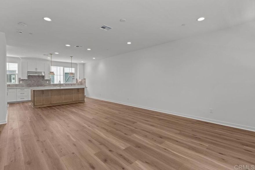 Modern Coastal Living – Live the ultimate Carlsbad lifestyle in this beautifully upgraded 4-bedroom, 3.5-bathroom home offering 2,070 sq ft of light-filled, open-concept living in a prime location. The gourmet kitchen features Wolf appliances, quartz countertops, and shaker-style soft-close cabinetry, blending luxury and function. A spacious layout includes a private downstairs bedroom with en-suite bath, ideal for guests or multi-gen living. Additional upgrades include owned solar and a 2-car garage with EV charger. Enjoy incredible access to the outdoors — walk to Agua Hedionda Lagoon for paddleboarding, kayaking, or swimming, and hop on your e-bike to catch waves at Tamarack Beach, just minutes away. The community offers resort-style amenities including a pool, hot tub, dog park, and playground, and you’re surrounded by top-rated Carlsbad schools, coastal trails, shopping, dining, and more. Luxury finishes, unbeatable location, and a true coastal lifestyle — Welcome home to 2536 Elderberry Ln.