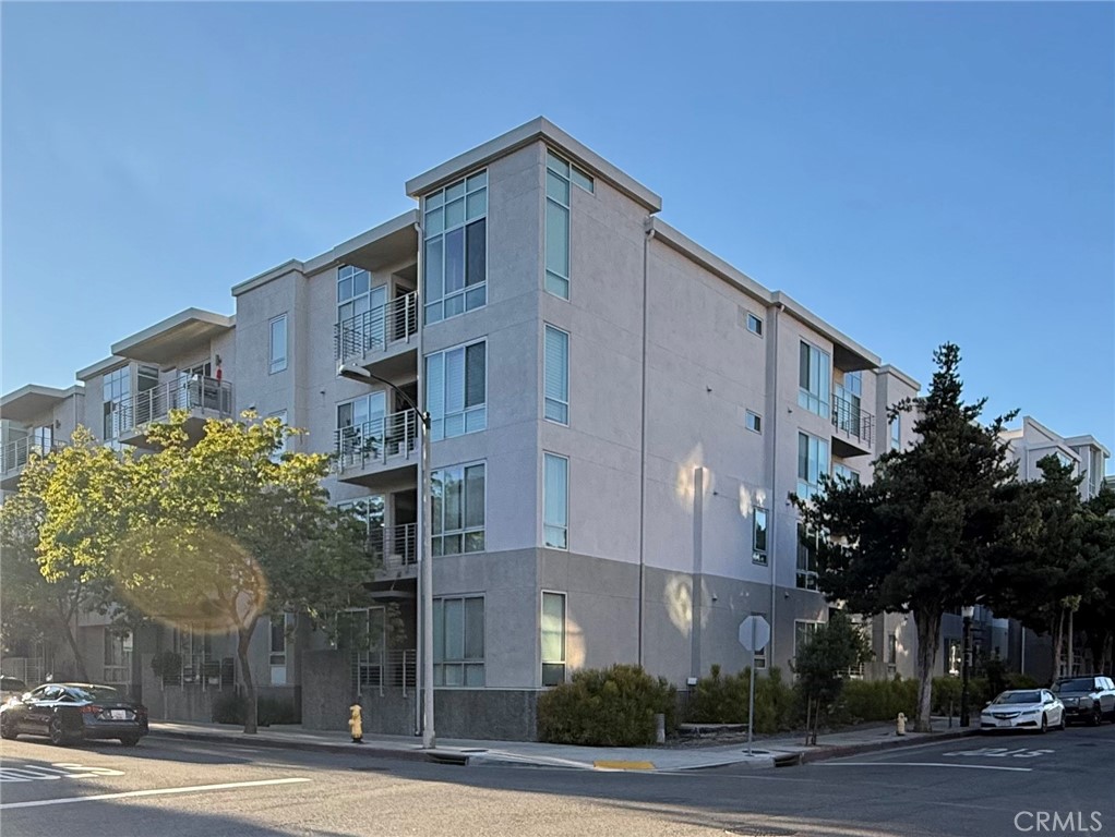 Elegant, fully updated condo located in the heart of Old Town Pasadena, originally built in 2007. Enjoy a prime location within walking distance of upscale restaurants, trendy bars, and boutique shopping. This stylish home offers 2 bedrooms and 2 bathrooms, a dedicated laundry area, and a private outdoor balcony. The spacious living room features rich hardwood floors and a cozy fireplace, while the modern kitchen boasts sleek quartz countertops. Both bathrooms have been tastefully renovated, and the bedrooms feature well-maintained, newer carpeting. Additional highlights include two reserved parking spaces and secure gated garage access.
