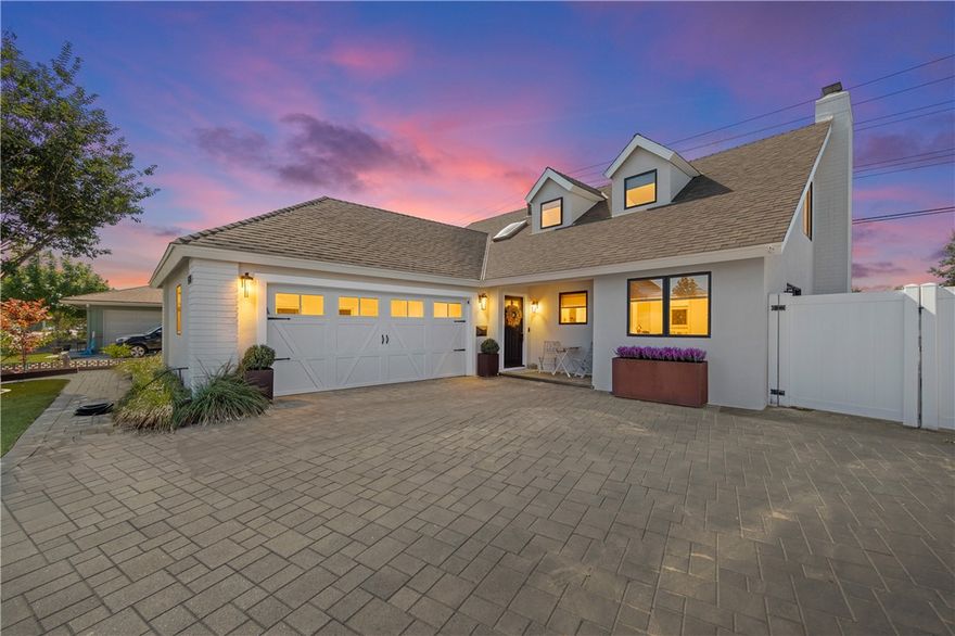 Tucked away on a cul-de-sac in the highly sought-after neighborhood of Garden Park, this beautifully remodeled home perfectly balances modern design with timeless comfort. Featuring 5 bedrooms and 2 bathrooms, the residence has been completely reimagined inside and out with on-trend finishes and thoughtful upgrades throughout. At the heart of the home, the remodeled kitchen showcases white shaker cabinets, quartz countertops, stainless steel appliances, and stylish lighting—offering both function and flair for everyday living and entertaining. The open-concept layout flows effortlessly into the spacious living and dining areas, enhanced by black dual-pane windows, updated interior doors, and designer light fixtures that fill the home with warmth and natural light. The primary suite serves as a true retreat, complete with a cozy fireplace, walk-in closet, and a luxurious marble bathroom featuring dual sinks and a walk-in shower. Four additional bedrooms provide flexibility for guests, a home office, or creative space. Modern amenities continue throughout, including a finished garage, full plumbing re-pipe with main supply line replacement, and a roof installed within the last 15 years. The exterior is equally impressive, with paver-lined driveway and RV parking, professional hardscaping, and a fully renovated backyard (completed in 2022) that transforms everyday life into a private resort. Enjoy sunny California days by the recently installed sparkling salt water pool, or entertain at the built-in BBQ with large island, ideal for gatherings under the stars. Perfectly positioned minutes from Seal Beach, attending top-rated GGUSD schools, Barker Elementary, Bell Intermediate, Pacifica High School, Westgrove Park, and just minutes from shopping, dining, and freeway access, this West Garden Grove gem embodies the best of Southern California living—modern, move-in ready, and made for lasting memories.