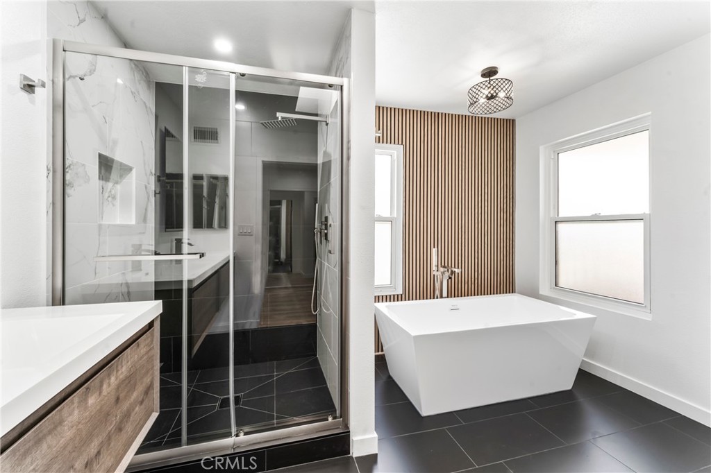 Welcome home to the heart of Encino, where modern living is redefined. This rare opportunity blends modern design with an enviable, sought-after location. This complex offers two pools, two spas, a clubhouse, a sauna room, a game room, a gated building, and gated parking which connect directly to your unit.
Inside is a fully remodeled, elegant TOWNHOME. The expansive layout provides generous space for entertainment. Sunlight pours through an abundance of windows. Whether you envision cozy evenings by the fireplace or entertaining on two separate private patios.
The kitchen is crafted for those who love to cook and entertain. It boasts premium finishes, a coffee/dry bar. Two large master bedrooms offer peaceful sanctuaries, while spa-inspired bathrooms provide the perfect respite after a long day. Each area of the property is imbued with comfort and craftsmanship, reflecting quality at every turn.
Outdoors, you’ll find private, beautifully landscaped grounds that invite relaxation and recreation. Mature trees, lush gardens, pools, and a secure and secluded setting. This residence achieves the ideal balance of privacy and accessibility.
Enjoy everything Encino offers, serene Encino Park a short distance from your doorstep, as well as celebrated dining at The Stand and Larsen’s Steakhouse, both under a mile away. Every day essentials, from shops to wellness centers, are at your fingertips, making daily life effortlessly convenient. Two minutes from 101 freeway, this is an ideal location.
At Encino Plaza North, every detail has been thoughtfully curated to delight even the most discriminating buyer. Luxury, comfort, and convenience converge like nowhere else.
Welcome home…
*For information concerning zoning, permits, additions & modifications, schools, condition of property, features, square footage, etc., for this property provided by the sellers' agents or obtained from public records & other resources are not guaranteed. The buyer is advised to independently verify the accuracy of that information & personally satisfy themselves through inspections. conducted with appropriate professionals or inquiring themselves to these entities or local municipalities.