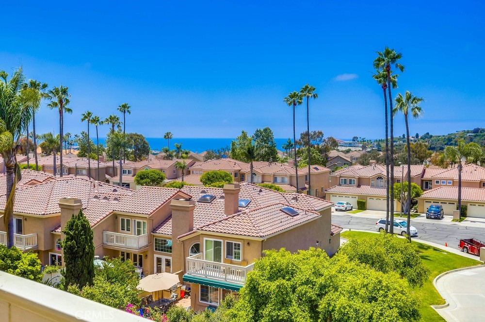 Welcome to the coastal community of Le St. Tropez in Laguna Niguel! This incredible, highly upgraded home is a stunning 3-bedroom, 2.5-bath townhouse-style residence that seamlessly combines comfort and style, all while offering breathtaking ocean and canyon views. Ideally located, this property provides an extraordinary opportunity for those seeking an active and vibrant coastal lifestyle. This property occupies one of the most desirable corner unit location.
As you step inside, you'll be welcomed by a spacious open floor plan, perfect for relaxation and entertaining. The living area features large windows that fill the space with natural light, creating a warm and inviting atmosphere. Imagine savoring your morning coffee on the private wrap-around patio while taking in the panoramic vistas.
The well-appointed kitchen is a chef’s dream, equipped with top-of-the-line new appliances, ample counter space, and stylish cabinetry. Whether you're crafting a gourmet meal or whipping up a quick snack, this kitchen will inspire your culinary adventures.
Each of the three generous bedrooms provides comfort and privacy, making this home ideal for families or anyone who appreciates extra space. The master suite serves as a true retreat, complete with a private balcony showcasing stunning ocean and canyon views, an en-suite bath, and a walk-in closet. Each bedroom is thoughtfully designed to ensure a tranquil and restful atmosphere.
This property also includes the convenience of a 2-car garage with EV charger and offers ample storage for all your belongings. Community amenities feature a sparkling swimming pool, tennis courts, well-maintained landscaping, and easy access to nearby walking trails along the coastline.
Located just a short distance from Salt Creek Beach, The Ritz-Carlton, Waldorf-Astoria, and the local shops, restaurants, and entertainment options of Laguna Beach, this property allows you to fully embrace the best of coastal living. Schedule a showing today and immerse yourself in the beauty and serenity that this exceptional home has to offer!