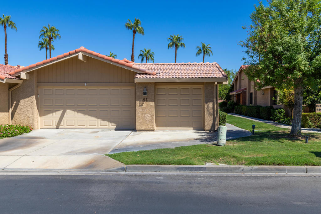 Welcome to this professionally designed and totally upgraded 3 bedroom (with ceiling fans), 3 full bath, turnkey home with beautiful high end luxury vinyl flooring throughout and carpeted bedrooms. Upon entering, there is a large, picturesque window in the dining area with black glass chandelier. All the original windows have been retrofitted with Milgard dual pane high efficiency windows! The many, many, upgrades in the house include a completely remodeled and gorgeous bright kitchen, completely remodeled bathrooms, a home office inspirationally designed from a traditional atrium, home theater system, recessed lighting, and a ''finished'' garage, large enough for 2 cars and 2 golf carts, and storage cabinets. Garage also has LED lighting panels, finished ceiling, with blown insulation above. There are tasteful non-slip garage tiles on the floor. The ''systems'' in this home include a new 5-ton Trane heat pump, a Trane Comfort link thermostat and upsized and insulated AC ducting. The north facing home has an extended outside patio with composite decking tiles, plenty of entertaining space and lovely views. Finally, well-appointed window coverings throughout the home and custom shelving in the hallway lead into the laundry area with high-end washer and dryer and plenty of storage space. This home is one of a kind and located in the center of Palm Desert, Chaparral Country Club offers 18 holes of golf, 21 pools & spas, tennis, pickleball, a fully equipped fitness room, activity center, pool and card tables and a remodeled clubhouse with excellent dining and entertainment. This home is a true gem!