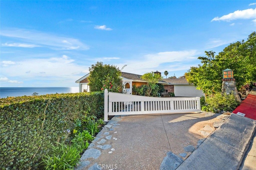 Photo of 2 N Vista De La Luna, Laguna Beach, CA 92651 (MLS # LG26007209)