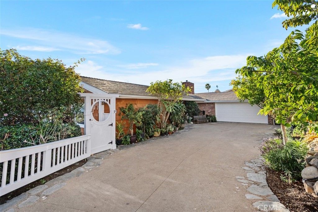 Photo of 2 N Vista De La Luna, Laguna Beach, CA 92651 (MLS # LG26007209)